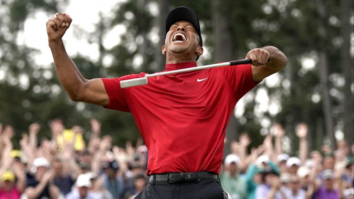 Tiger Woods wins the Masters golf tournament April 14 in Augusta, Ga.