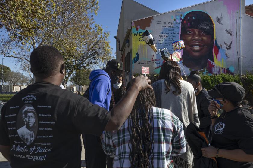 LOS ANGELES, CA - JANUARY 01: A mural of Latasha Harlins was unveiled at the Algin Sutton Recreation Center in Los Angeles on Friday, Jan. 1, 2021. She would have been 45 years old on this day. Harlins was shot and killed by a Korean shop keeper in 1991 who thought she was stealing orange juice. (Myung J. Chun / Los Angeles Times)