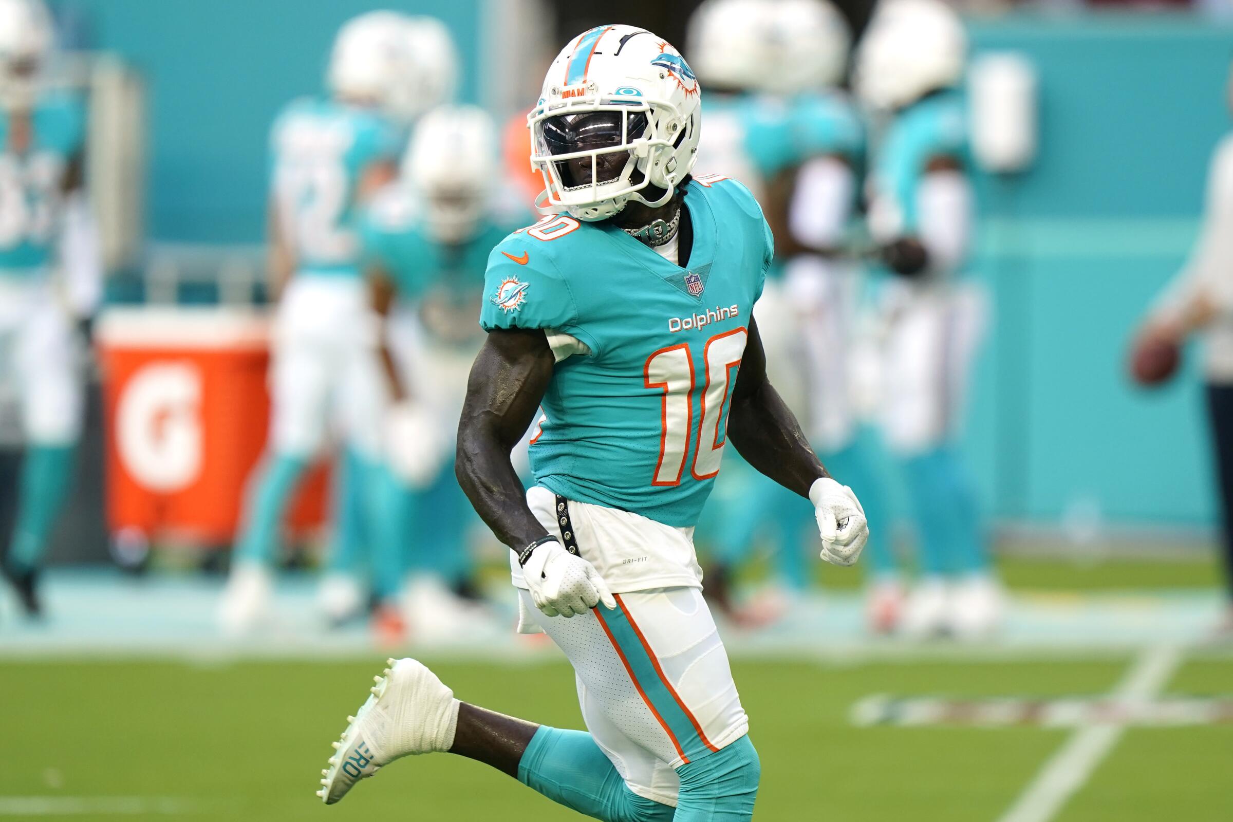 Miami Dolphins wide receiver Tyreek Hill (10) runs before a  preseason football game.