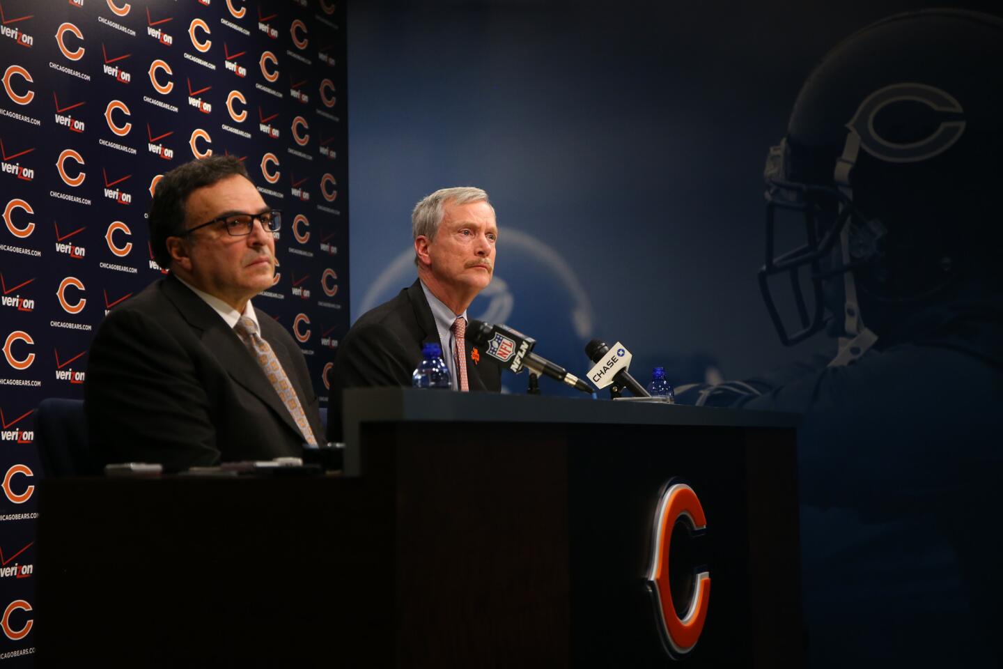 Chicago Bears team president Ted Phillips, left, and chairman George McCaskey address the media about the recent firings of head coach Marc Trestman and general manager Phil Emery.