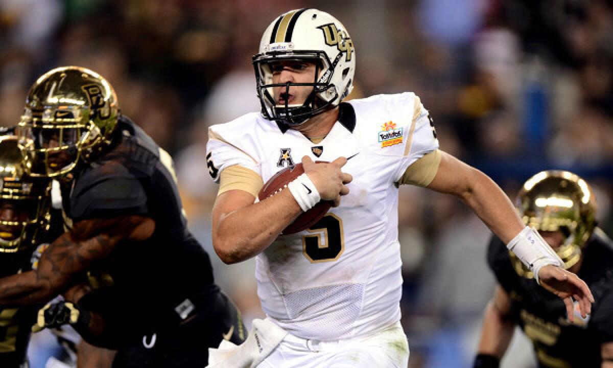 Central Florida quarterback Blake Bortles runs the ball during the Knights' 52-42 upset win over Baylor in the Fiesta Bowl on Wednesday night.