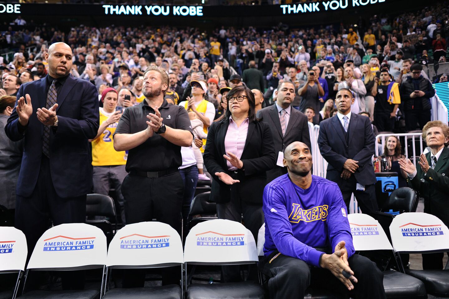 Kobe Bryant is all smiles as a video is played honoring him before a game with the Jazz in Salt Lake City on March 28.
