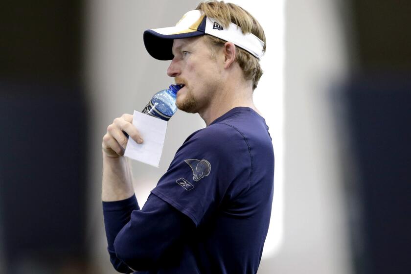 FILE PHOTO - St. Louis Rams general manager Les Snead watches from the sidelines during a rookie minicamp at the NFL football team's practice facility Friday, May 8, 2015, in St. Louis. (AP Photo/Jeff Roberson)
