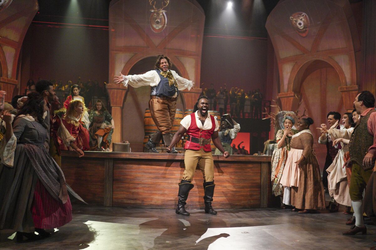 Joshua Henry as Gaston and Rizwan Manji as Lefou in ABC's "Beauty and the Beast: A 30th Celebration."