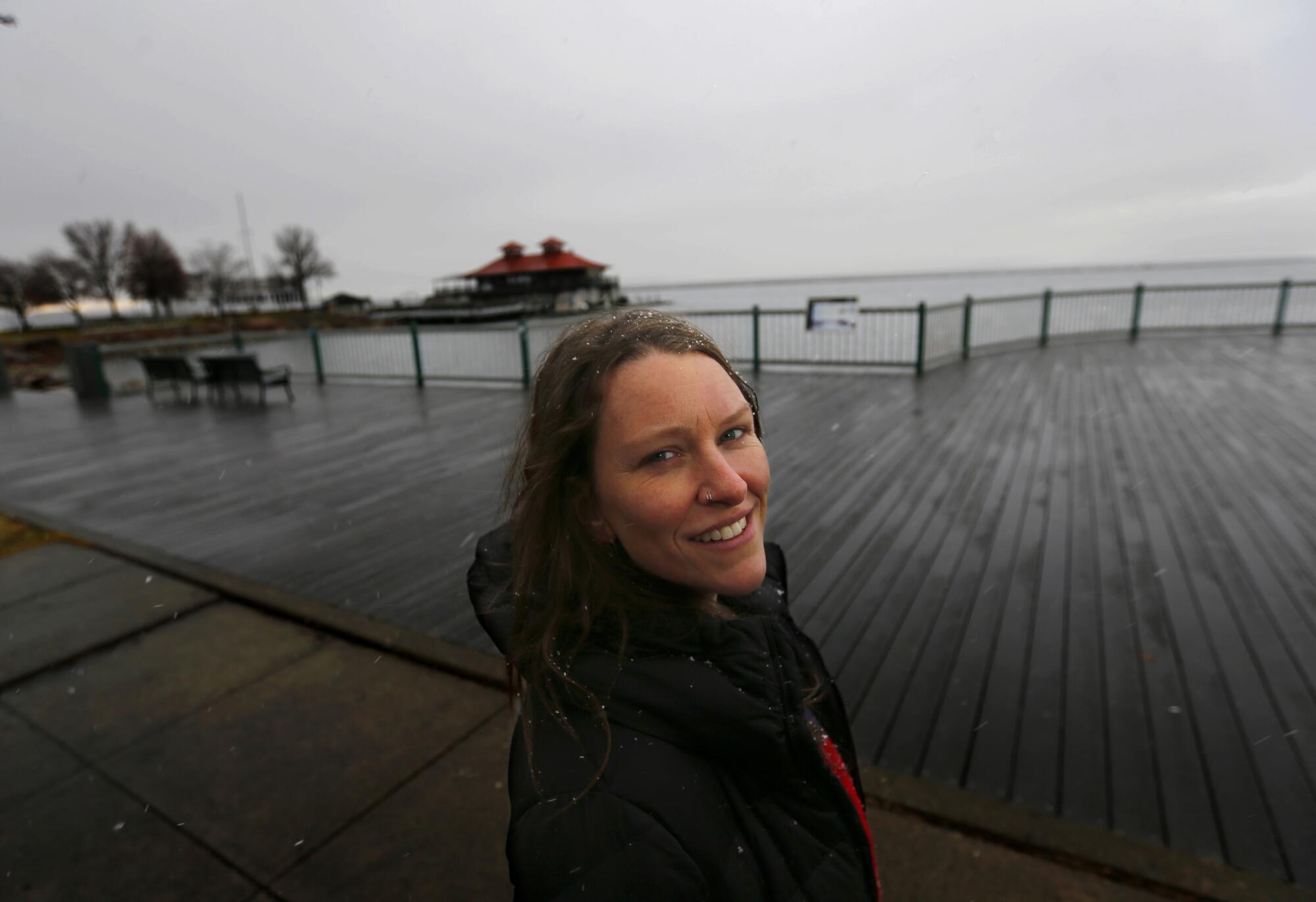 Ashley Horton walks along the waterfront of Burlington, where she first met Bernie Sanders several years ago.