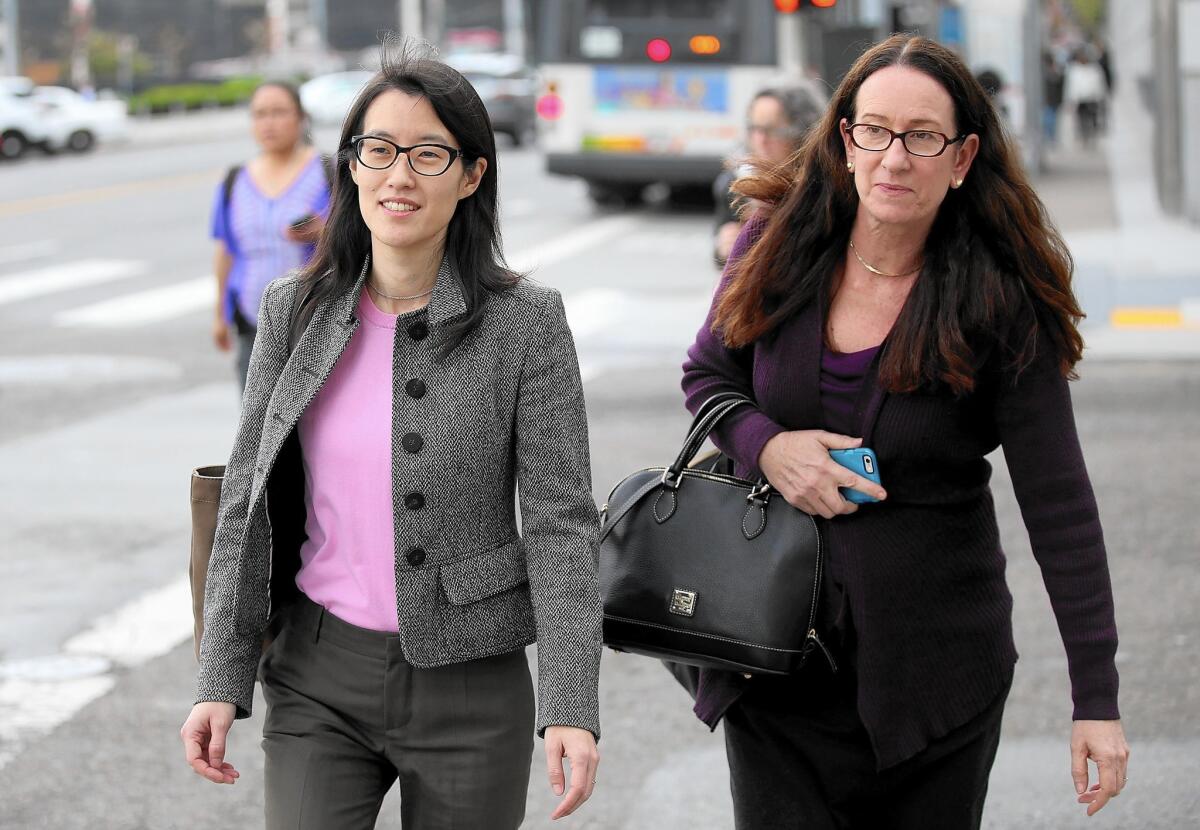 Ellen Pao, left, leaves court with her attorney Therese Lawless during a lunch break from her trial. She is suing her former employer, Silicon Valley venture capital firm Kleiner Perkins Caufield & Byers.