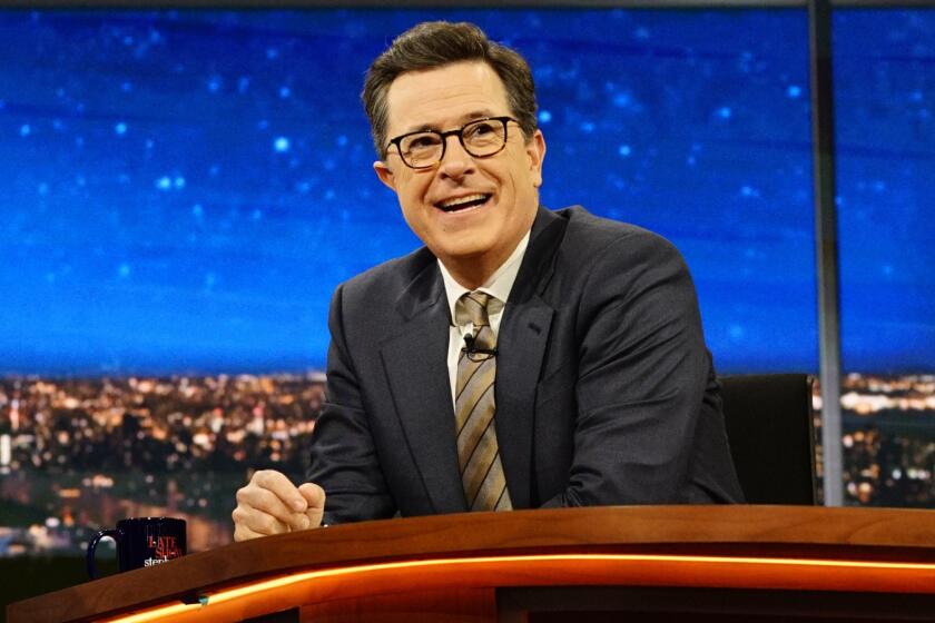 In this March 31, 2017 photo released by CBS, host Stephen Colbert appears on "The Late Show with Stephen Colbert" in New York. Colbert won in the Nielsen company's ratings for the ninth consecutive time last week, his margin of 400,000 viewers the widest lead since the CBS star overtook Fallon with a sharp concentration on politics. Fallon aired a rerun Friday, otherwise the shows were all fresh last week. (Richard Boeth/CBS via AP)
