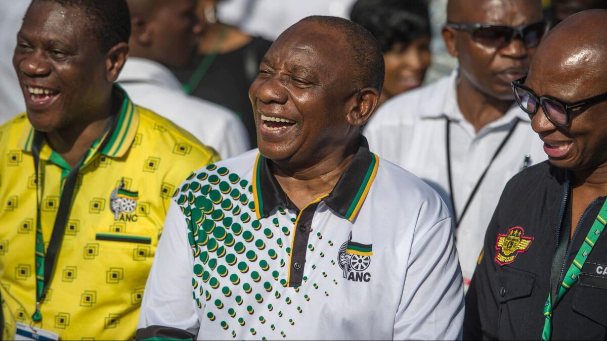 The African National Congress ruling party's newly elected president, Cyril Ramaphosa, arrives to take part in the fourth day of the party's conference, on Dec. 19, 2017.