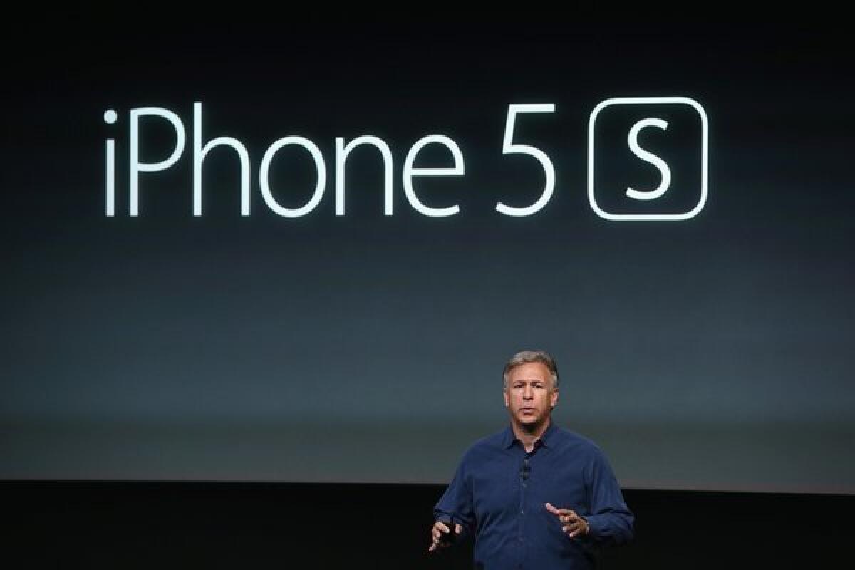 Apple Senior Vice President of Worldwide Marketing at Phil Schiller speaks about the new iPhone 5S during an Apple product announcement at the Apple campus.