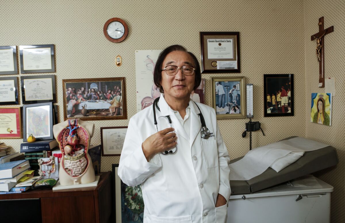 Dr. John Jae-dong Kim at his clinic in Upland. Kim is a Catholic deacon and gastroenterologist who is one of the organizers behind a Koreatown matchmaking event for parents with unmarried children.