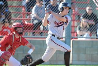 Etiwanda freshman Brady Ebel is shown swinging at a pitch. 