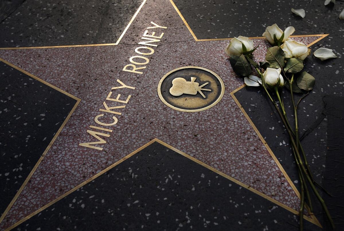 A floral tribute lies on Mickey Rooney's star on the Hollywood Walk of Fame on Monday. Is today's entertainment industry inhospitable to development of a similarly multitalented performer?