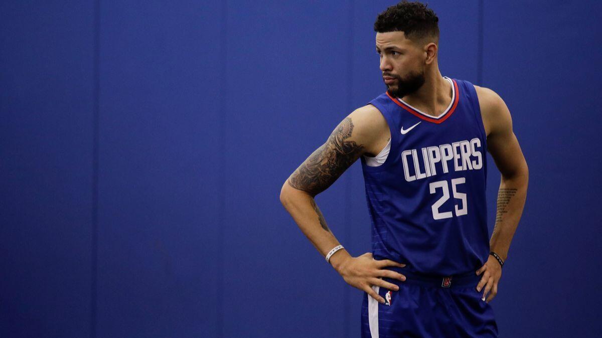 Clippers' Austin Rivers waits for a news conference to start during media day Monday.