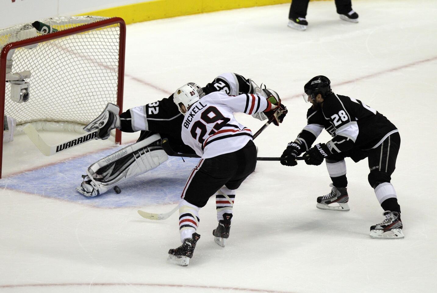 Bryan Bickell, Jonathan Quick, Jarrete Stoll