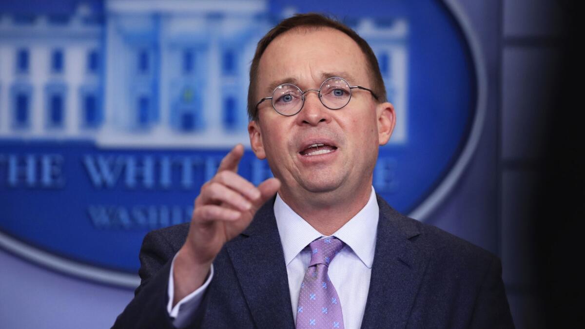 Office of Management and Budget Director Mick Mulvaney, shown at the White House in March, has given big pay raises to the deputies he has hired at the Consumer Financial Protection Bureau.