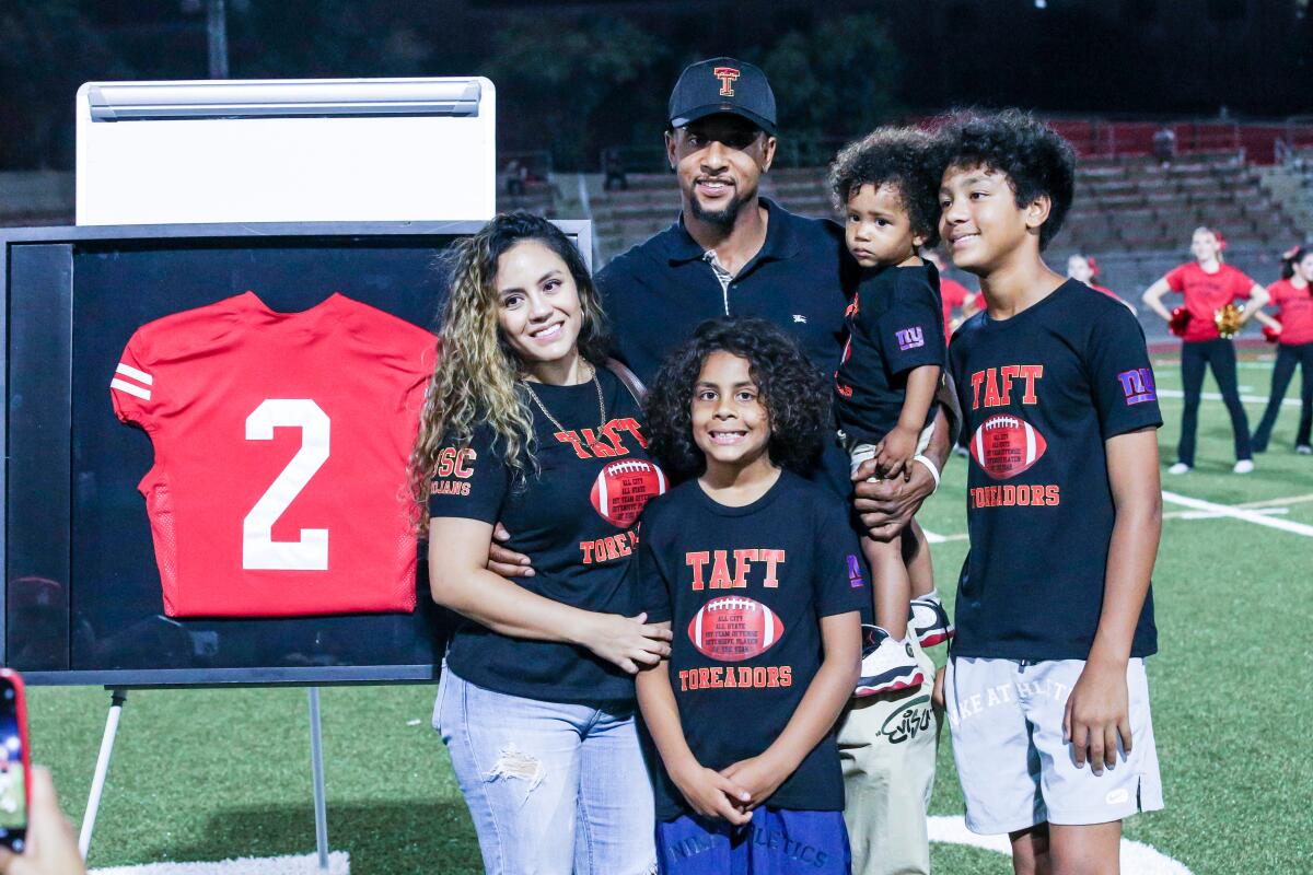 Steve Smith had his No. 2 Taft High jersey retired on Thursday. His wife, Alyssa, was there,