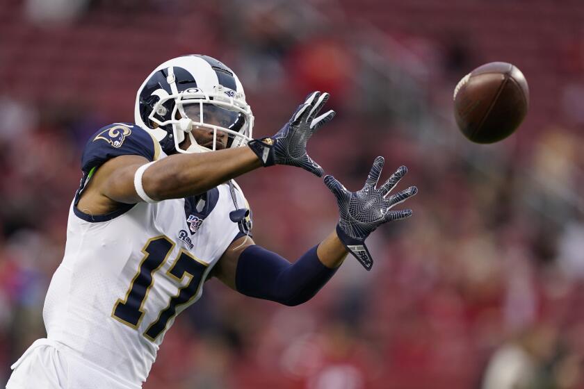 Rams wide receiver Robert Woods warms up before a game.