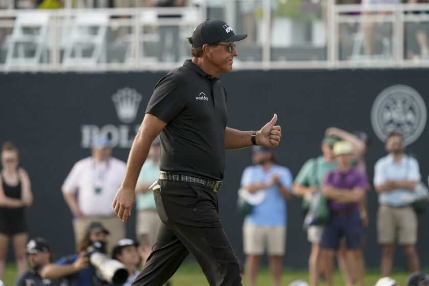 Phil Mickelson walks up the 18th fairway in the third round of the PGA Championship on May 22, 2021, in Kiawah Island, S.C.