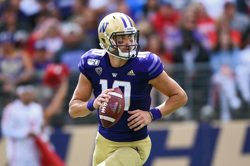 Washington quarterback Jacob Eason #10 of the Washington Huskies looks for an open receiver during the first game of the season against the Eastern Washington Eagles at Husky Stadium on August 31, 2019 in Seattle, Washington. (Photo by Alika Jenner/Getty Images)