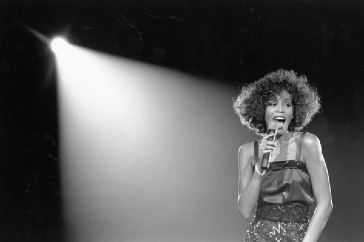 Whitney Houston, pictured performing onstage in 1988, would have been 50 years old on Friday. She died in 2012.