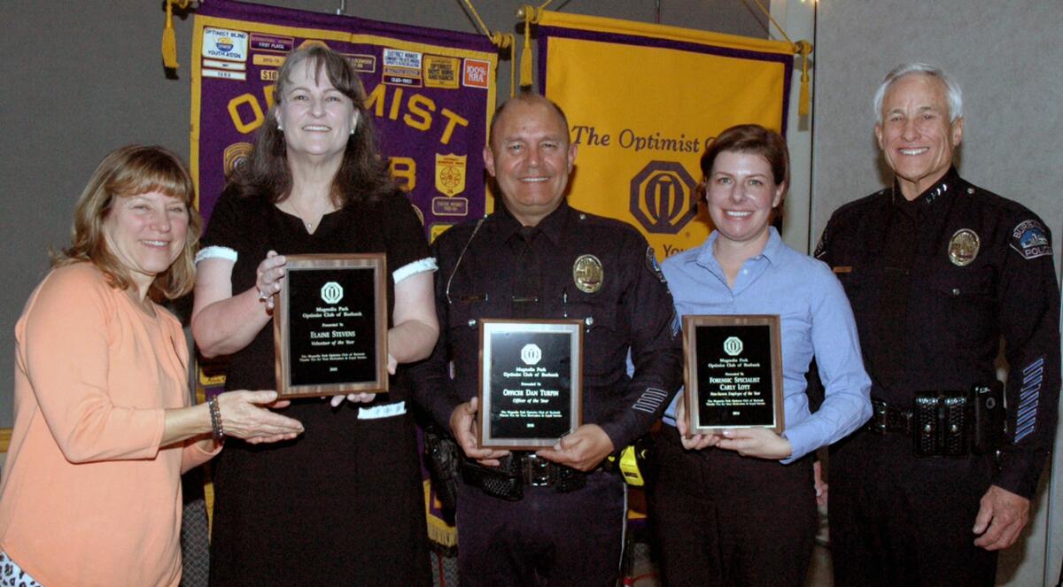 Optimist Club President Doreen Wydra, from left, with honorees Elaine Stevens, Officer Dan Turpin and Carly Lott, and Burbank Police Chief Scott LaChasse.