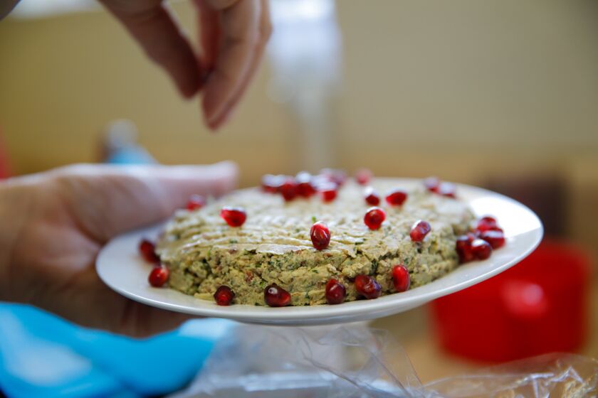 A hallmark of the Georgian table, pkhali incorporates a mixture of ground vegetables. Avetian's version is made from kidney beans with pomegranate seeds sprinkled on top.