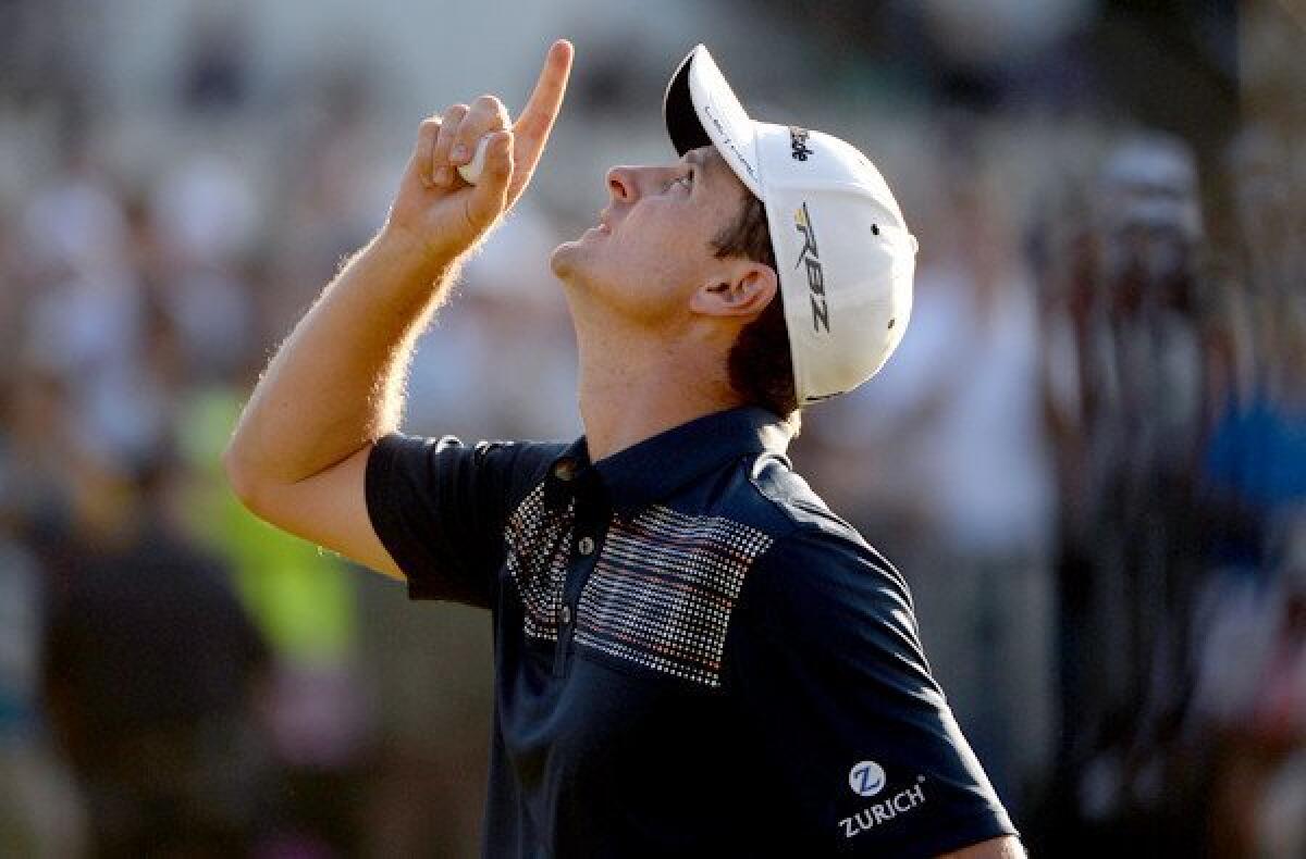 Justin Rose of England looks skyward in honor of his late father after finishing the fourth round of the U.S. Open on Sunday at Merion Golf Club.