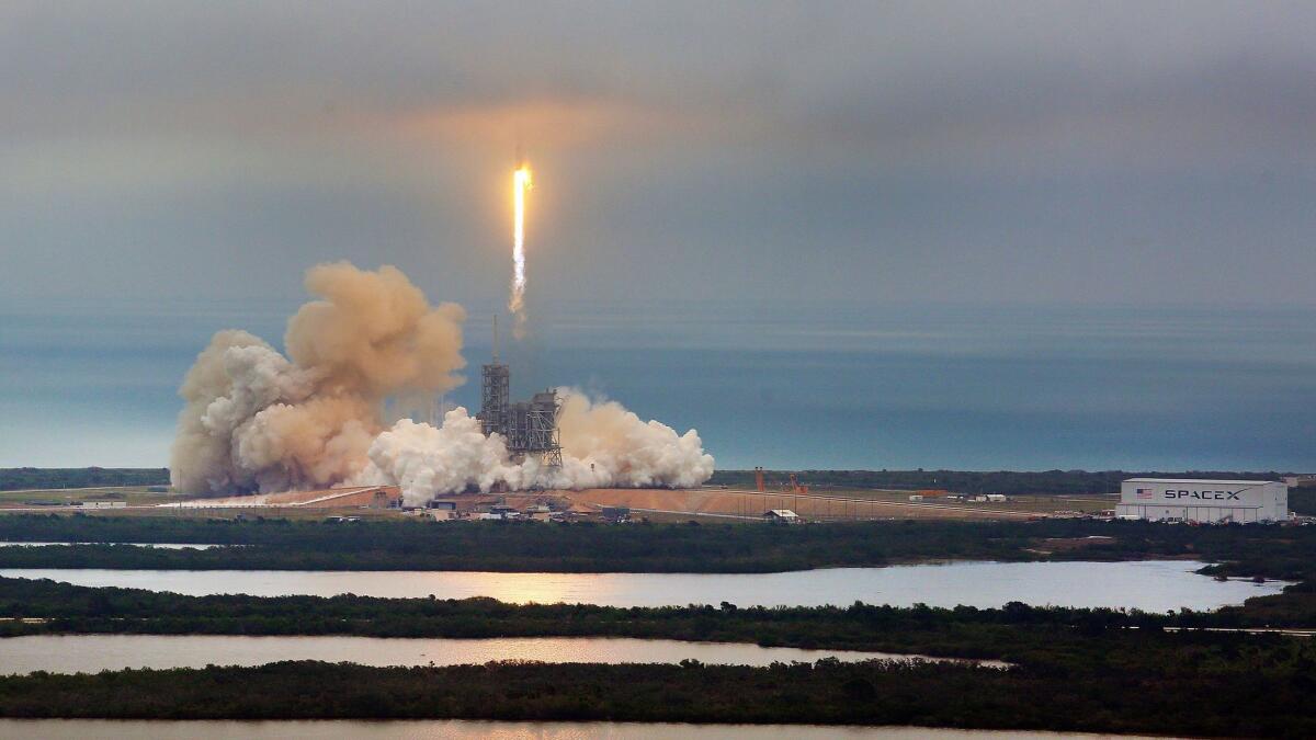 A SpaceX Falcon 9 rocket blasts off Feb. 19 from Kennedy Space Center in Florida.