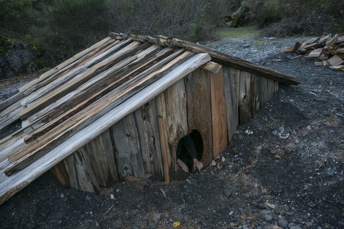 The Yurok people traditionally lived in redwood plank villages along the river. The sweat house, like the one Frankie Myers helped build here, was a key part of village life.