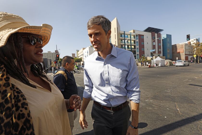LOS ANGELES, CALIFORNIA--SEPT. 17, 2019--Texas Representative Beto O'Rourke, who is seeking the Democratic nomination, visits downtown Los Angeles and the Downtown Women's Center on Sept. 17, 2019. Beto takes a walking tour with Suzette Shaw, left, a homeless advocate. (Carolyn Cole/Los Angeles Times)