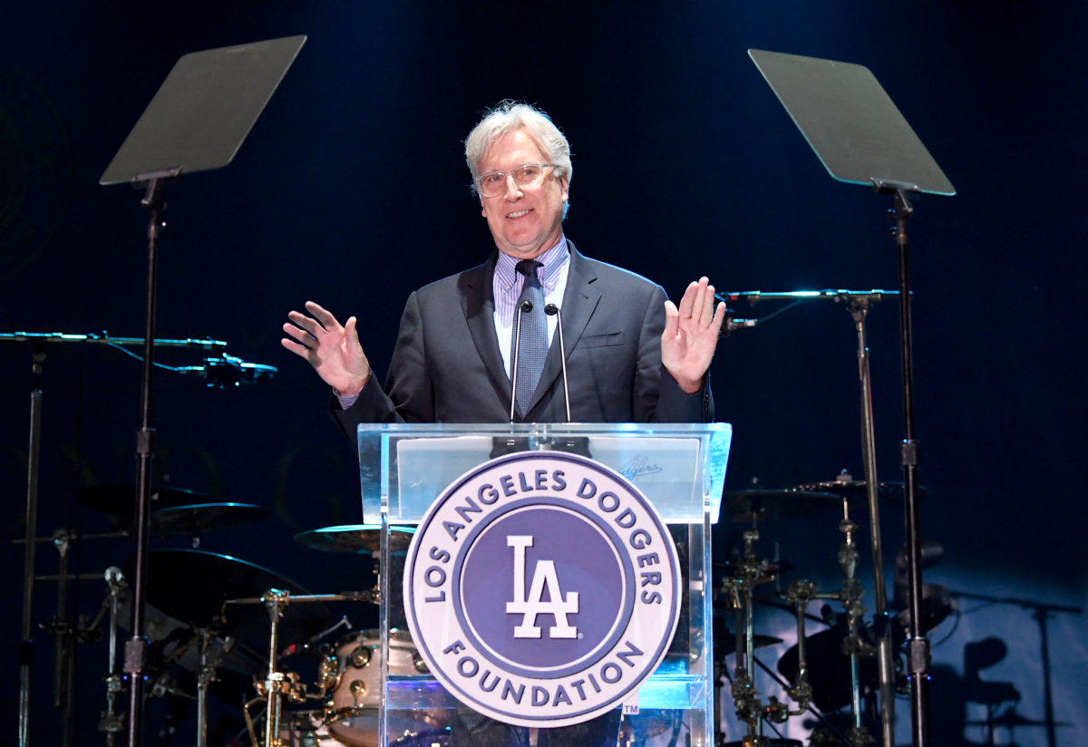 Dodgers co-owner Mark Walter speaks at a lectern