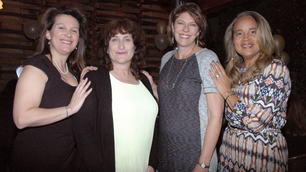 Johanna Klohn, from left, Amy Lawrence, Teresa Weeden and Natasha Mahone are board members of National Charity League, Burbank Chapter.
