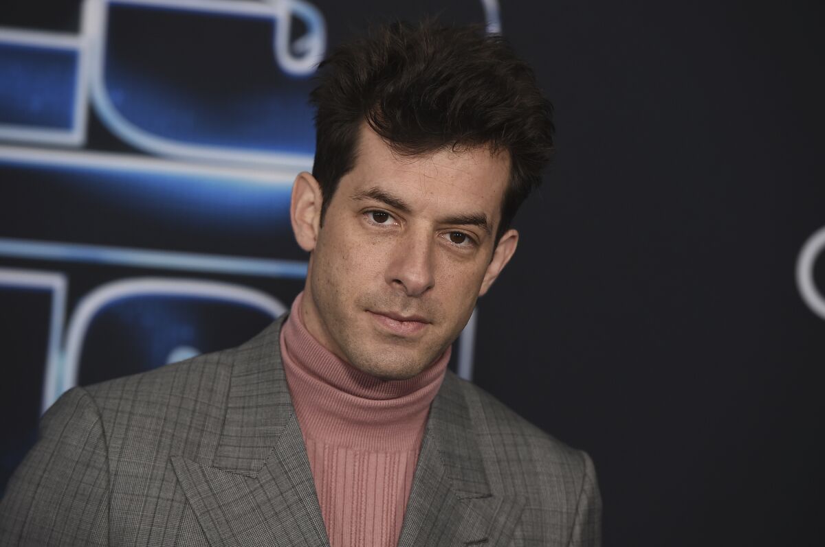 FILE - Mark Ronson appears at the world premiere of "Spies in Disguise" in Los Angeles on Dec. 4, 2019. The Oscar and Grammy winning producer and songwriter has a deal with Grand Central Publishing for “93 ’Til Infinity,” scheduled for 2023. (Photo by Jordan Strauss/Invision/AP, File)