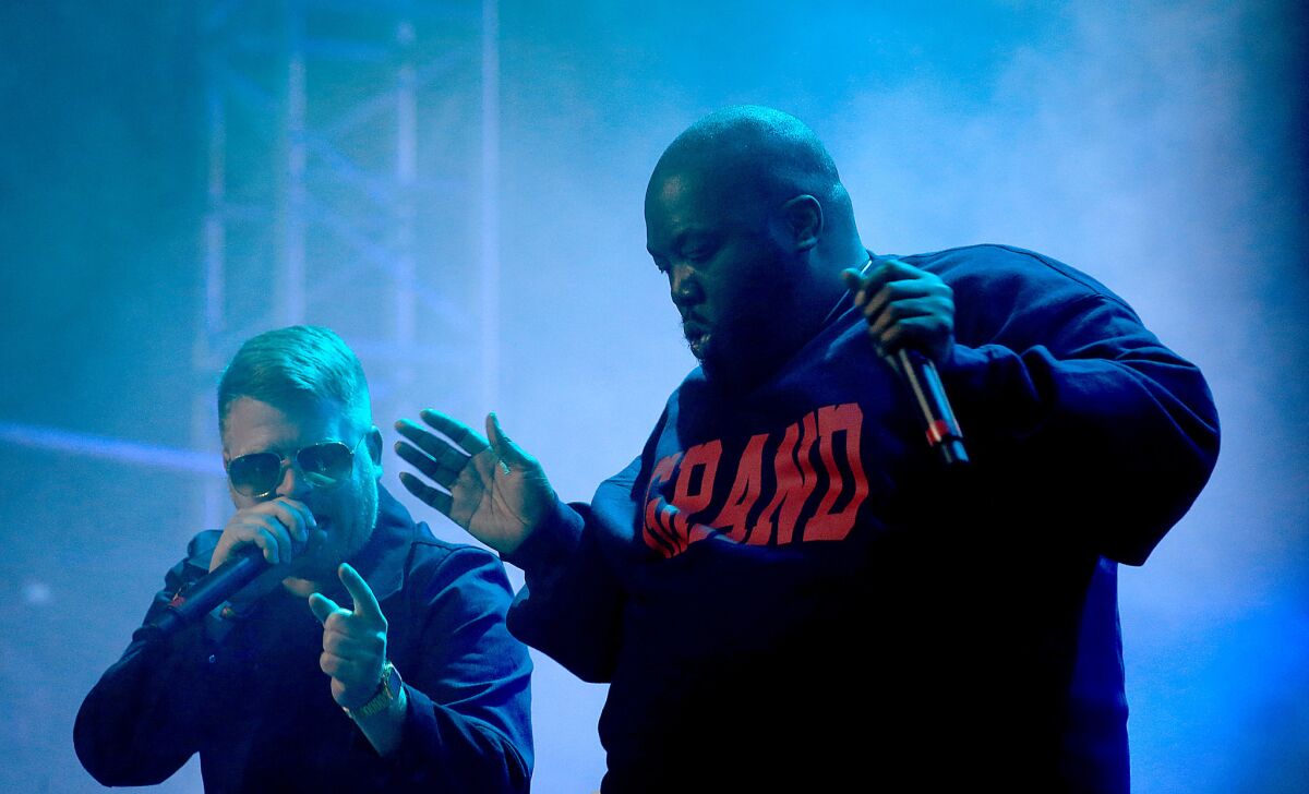 Run the Jewels, which features El-P, left, and Killer Mike, perform at Coachella in 2015. The hip-hop duo will perform as part of Banksy's Dismaland exhibition.