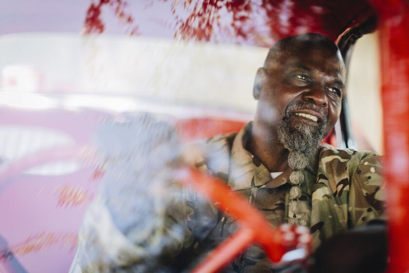 Artist, Fulton Leroy Washington also known as “Mr. Wash” photographed in his home in Compton, CA