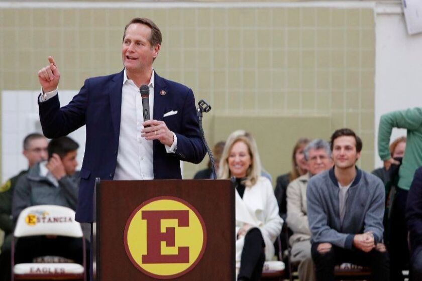 Rep. Harley Rouda (D-Laguna Beach) addresses his constituents during his first district town hall meeting in the gym at Estancia High School in Costa Mesa on Tuesday, February 19, 2019.