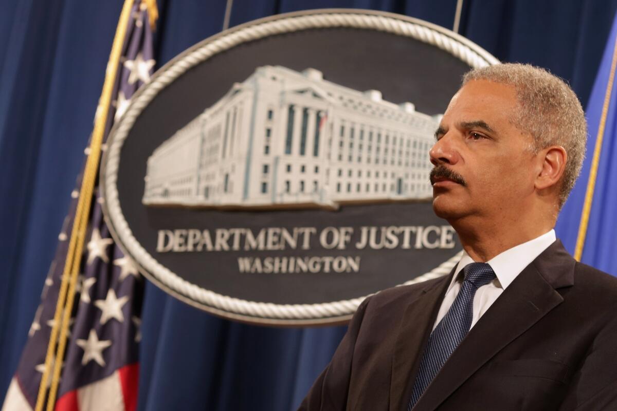 Atty. Gen. Eric Holder participates in a news conference in May.