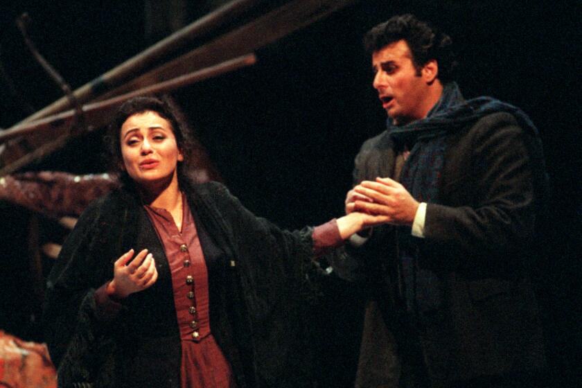 Leontina Vaduva and Marcello Giordani in Opera Pacific's production of "La Boheme" at the Orange County Performing Arts Center in Costa Mesa in 1998.