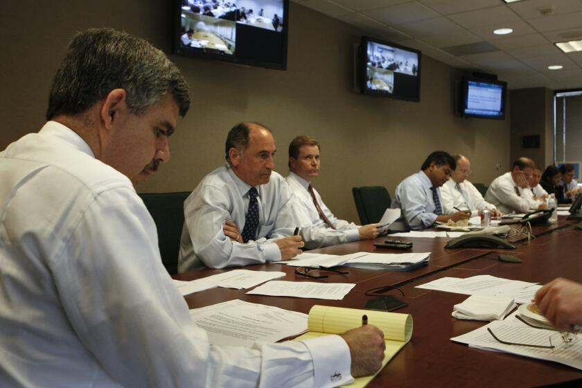 Mohamed El-Erian, left, Pimco's chief executive, presides over a meeting of the nine-member investment committee -- basically, the firm's brain trust, which makes major investment decisions
