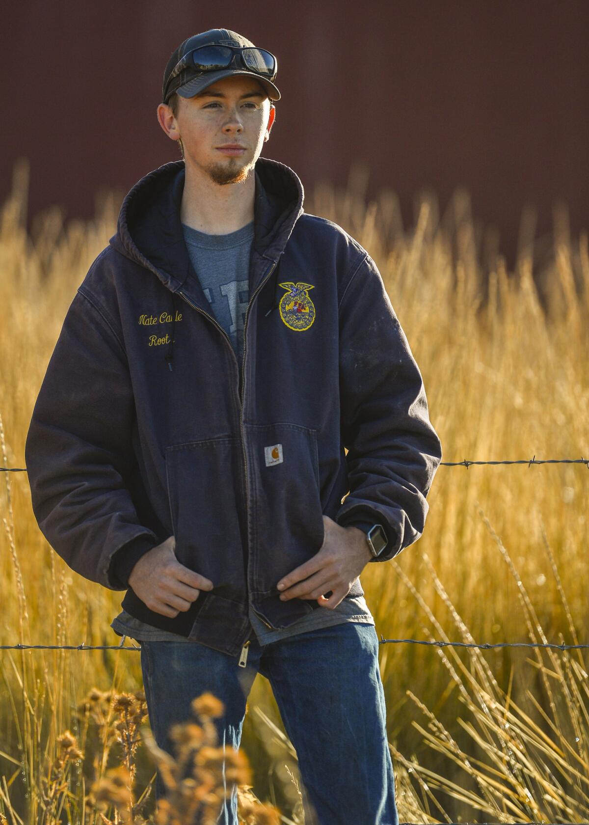 Nate Cable, a senior at Roots Charter High School, spent many evenings keeping watch over animals at the farm when the killer dog, which he encountered once, was a menace.