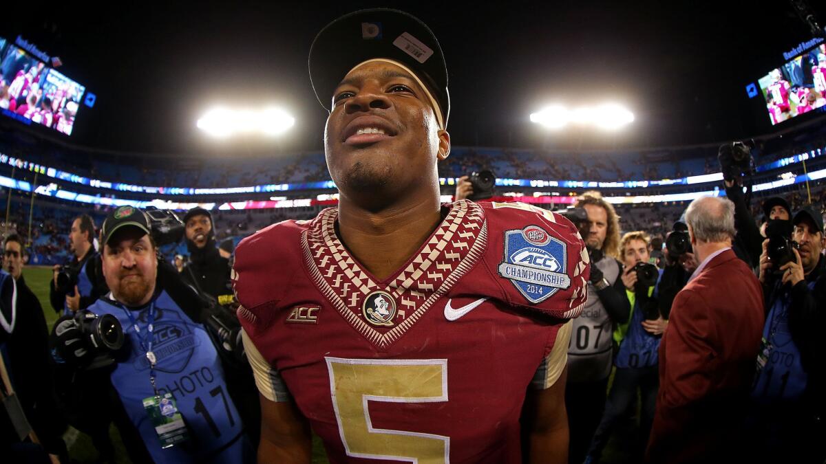 Florida State quarterback Jameis Winston celebrates after leading the Seminoles to victory over Georgia Tech in the Atlantic Coast Conference title game on Dec. 6.