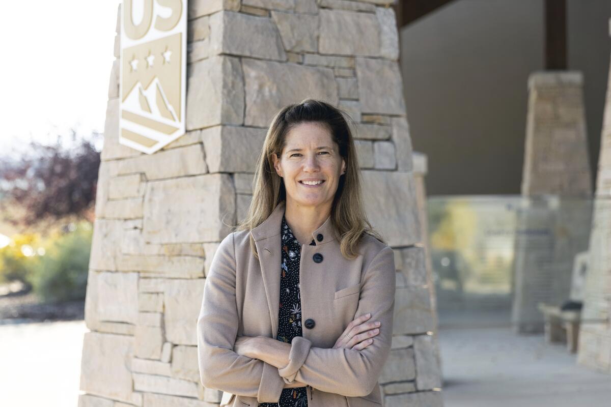 This Sept. 27, 2021, photo provided by U.S. Ski & Snowboard shows President and CEO Sophie Goldschmidt posed outside the USANA Center of Excellence in Park City, Utah. The new President and CEO of the U.S. Ski and Snowboard Association has vivid memories of her first time clicking into boots on a mountain in Chamonix, France, during a school trip at age 12. Sophie Goldschmidt’s best sport was always tennis — that’s what brought her from London to Baylor University on a scholarship — but the affinity for skiing stuck.(Sarah Brunson/U.S. Ski & Snowboard via AP)