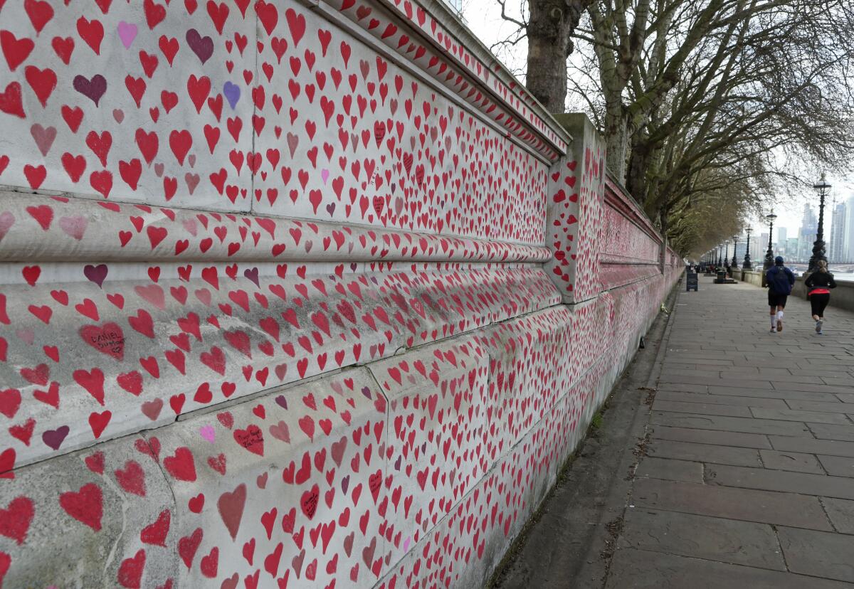 COVID-19 memorial wall of painted hearts
