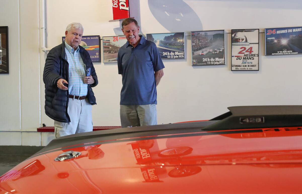 Carl Cullings and Jerry Creager, from left, during a LIFT outing at the Marconi Automotive Museum in Tustin. 