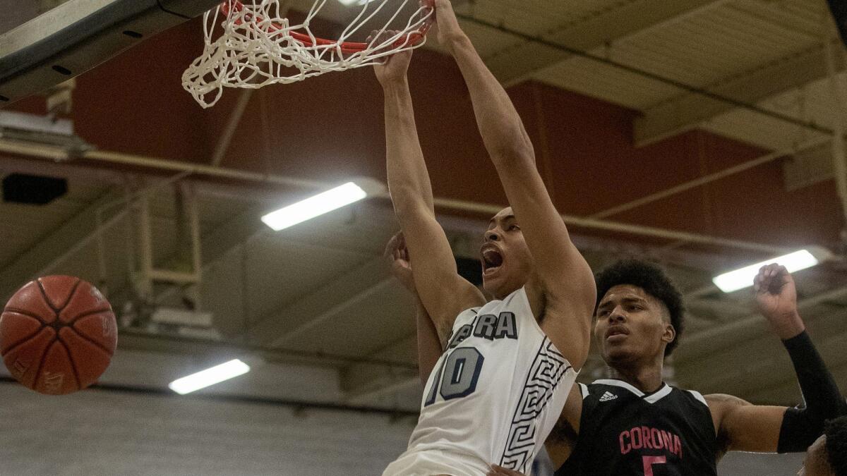 Sierra Canyon's Amari Bailey dunks against Corona Centennial during a Southern Section Open Division playoff game on Feb. 15, 2019.