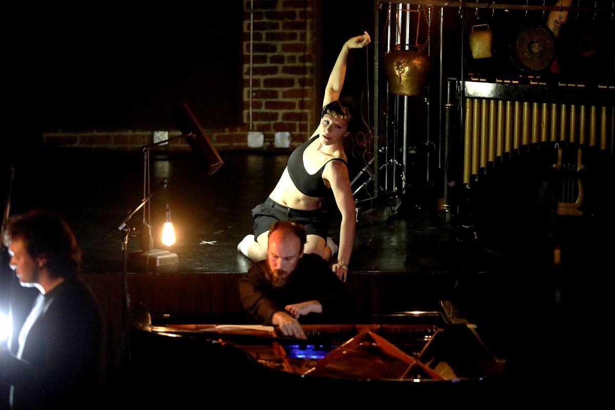 A dancer and musicians perform at the Hear Now festival in 2023.