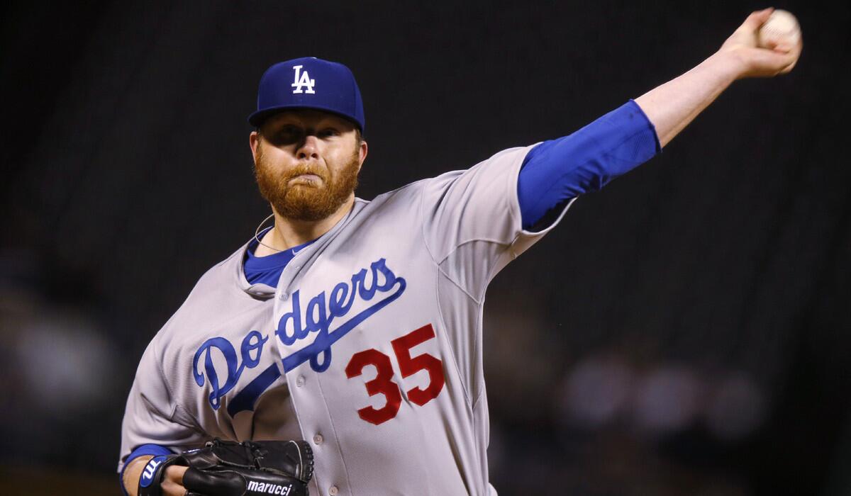 Los Angeles Dodgers starting pitcher Brett Anderson pitches against the Colorado Rockies on Friday.