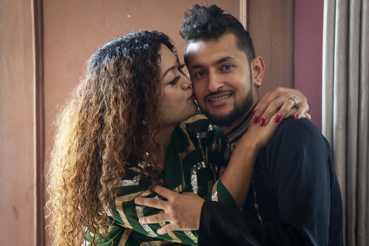 A couple embrace in Nepal.