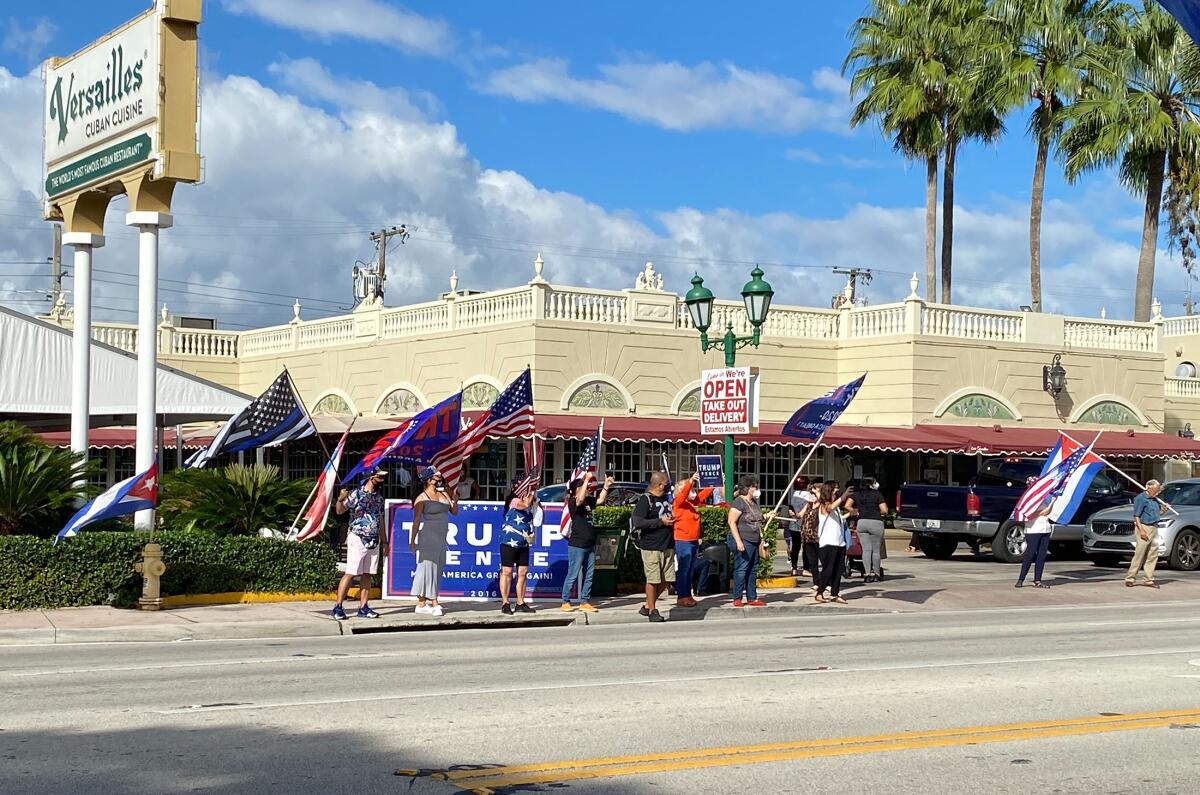 A group of Trump supporters protests against a Biden caravan on Oct. 18, in Miami.