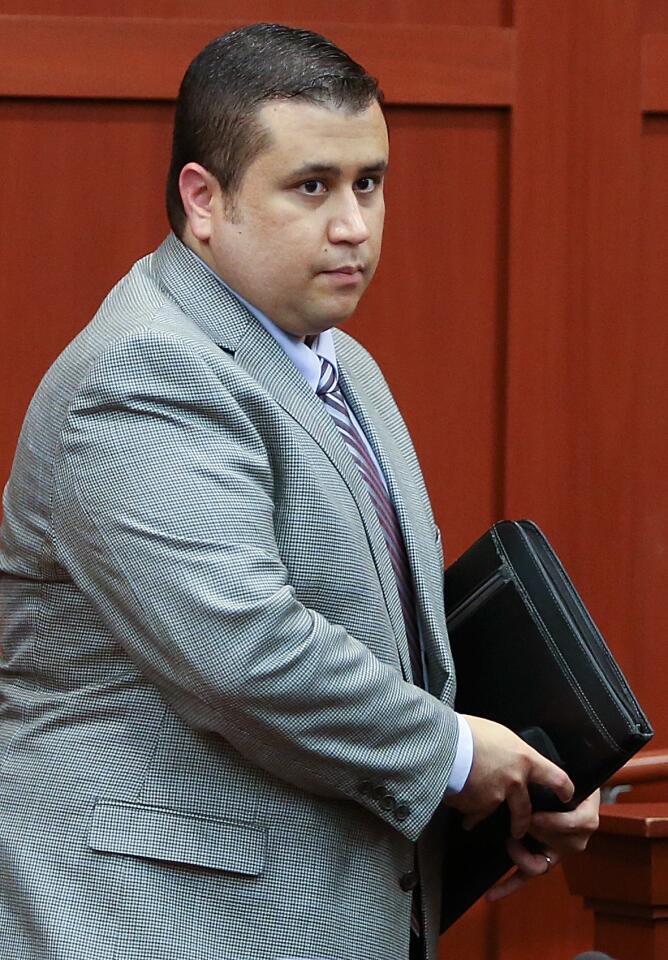 George Zimmerman leaves the court room at the conclusion of the fifth day of juror selection during his trial in Seminole circuit court in Sanford, Fla., Friday June 14, 2013. Zimmerman has been charged with second-degree murder for the 2012 shooting death of Trayvon Martin. (Gary W. Green/Orlando Sentinel, Pool).